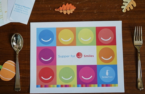 Supper for Smiles placemat with fork and spoon