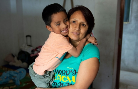 Anghelo hugs his mother after free cleft surgery in Peru