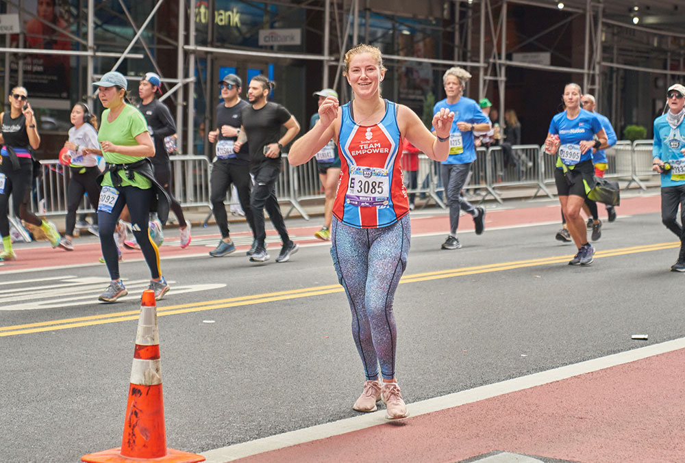 Meg Omecene running the NY Half